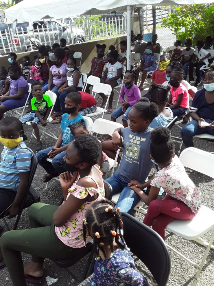 Children sitting together at a Big Harvest gathering