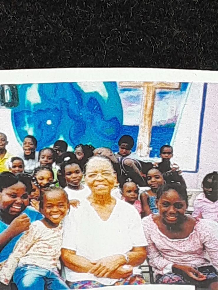 An archival group photograph from the Big Harvest community