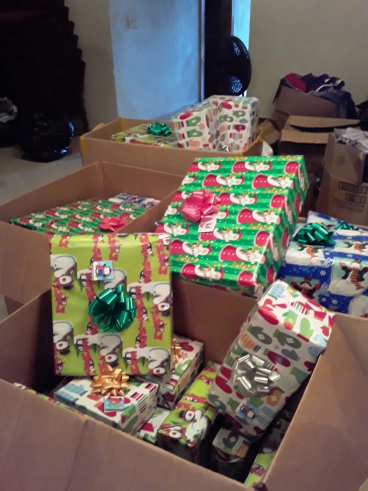Wrapped gifts prepared for a community gathering